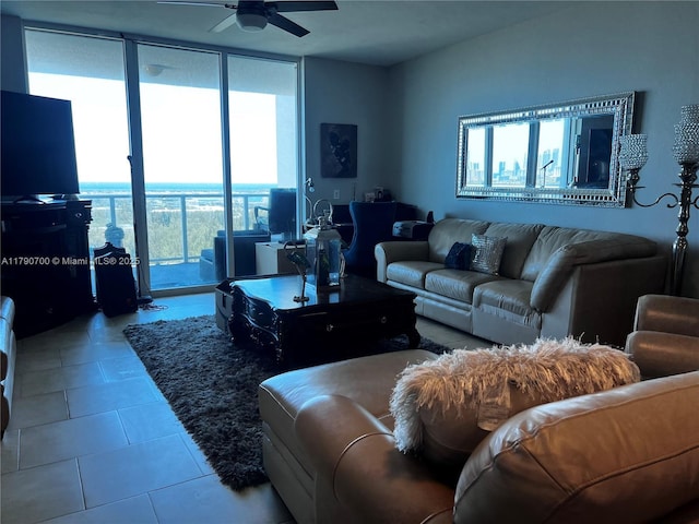 15051 Royal Oaks Ln Unit 2301, North Miami, FL 33181 - living room with a wall of windows, healthy amount of natural light, ceiling fan, and tile patterned floors