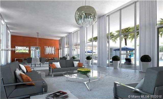 15051 Royal Oaks Ln Unit 2301, North Miami, FL 33181 - lobby with a wall of windows