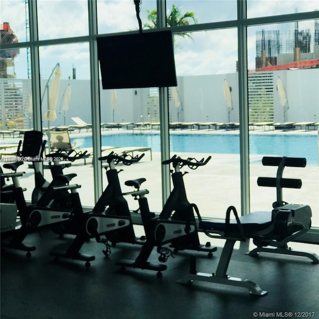15051 Royal Oaks Ln Unit 2301, North Miami, FL 33181 - exercise room featuring a wall of windows