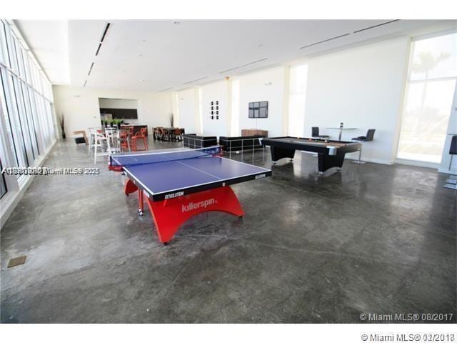 15051 Royal Oaks Ln Unit 2301, North Miami, FL 33181 - recreation room with finished concrete floors and billiards table