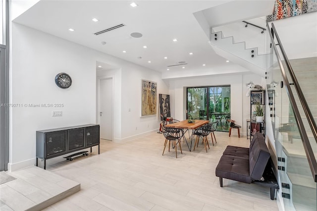 1311 Bay Dr, Miami Beach, FL 33141 - dining room featuring light wood-style flooring, stairway, visible vents, baseboards, and recessed lighting