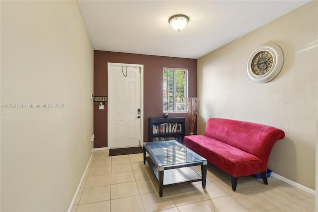 21421 NW 13th Ct Apt 211, Miami Gardens, FL 33169 - entryway with baseboards and light tile patterned floors