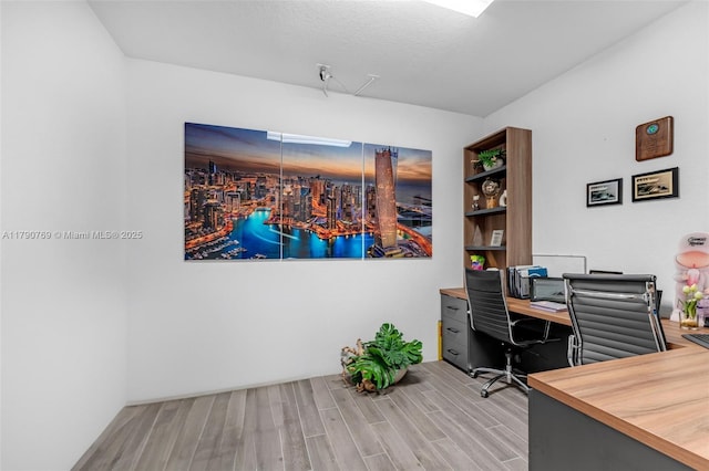 office area featuring light wood finished floors