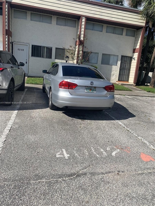 view of uncovered parking lot