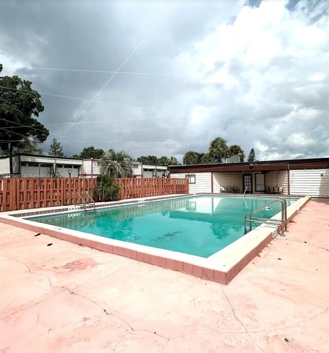 4002 Dolomite Unit A, Orlando, FL 32839 - community pool with a patio