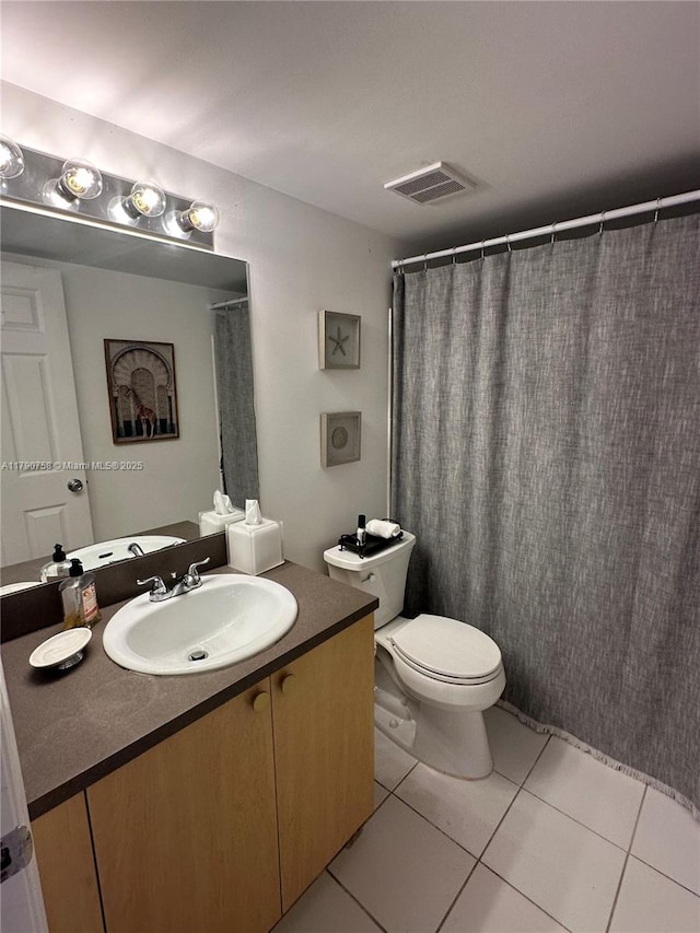 full bathroom featuring visible vents, toilet, tile patterned flooring, and vanity