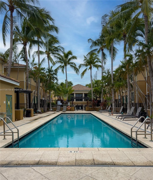 pool featuring a patio area