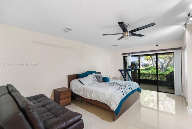 371 Fairway Cir Unit 56, Weston, FL 33326 - bedroom with tile patterned floors, access to exterior, visible vents, a ceiling fan, and a textured ceiling