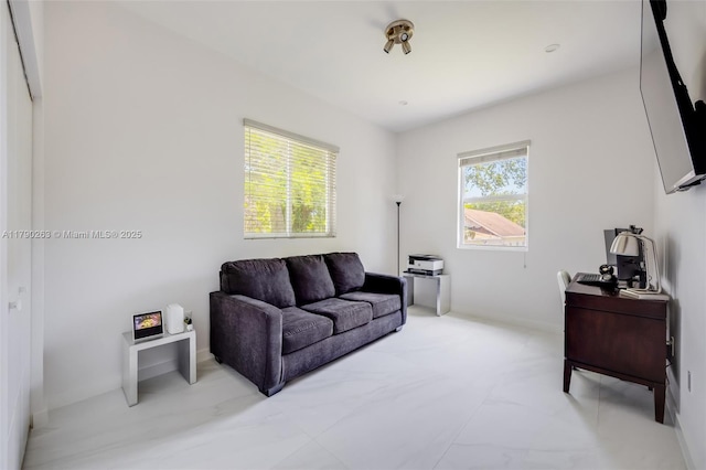 3648 Oak Ave, Coconut Grove, FL 33133 - living room featuring baseboards