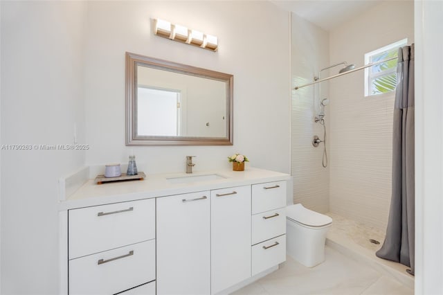 3648 Oak Ave, Coconut Grove, FL 33133 - bathroom featuring vanity, tile patterned flooring, toilet, and tiled shower