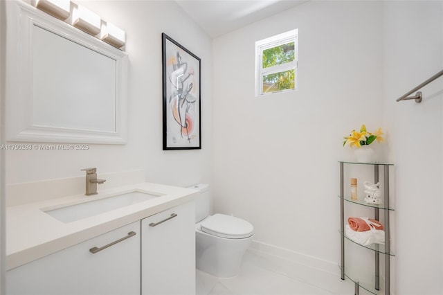 3648 Oak Ave, Coconut Grove, FL 33133 - half bathroom featuring vanity, baseboards, toilet, and tile patterned flooring