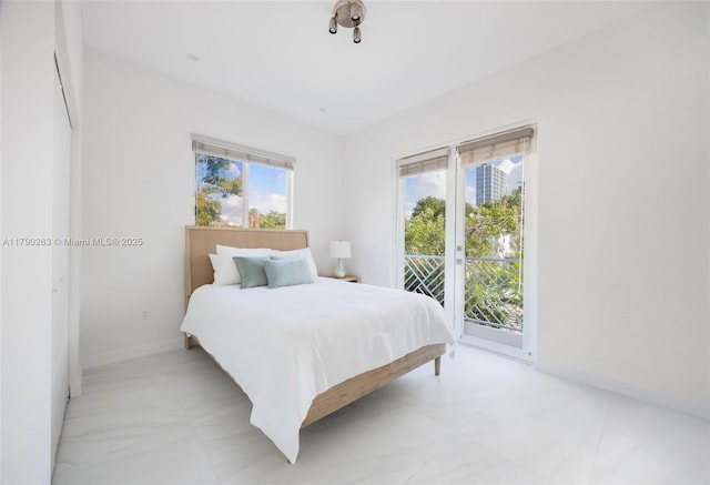 3648 Oak Ave, Coconut Grove, FL 33133 - bedroom with access to outside and baseboards