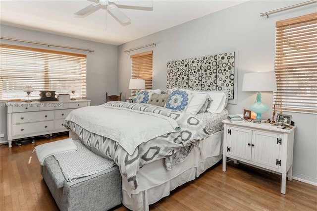 bedroom featuring wood finished floors and ceiling fan