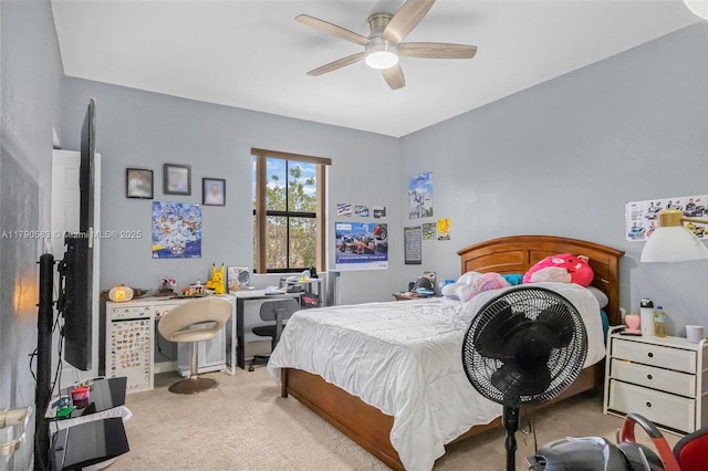 carpeted bedroom with a ceiling fan