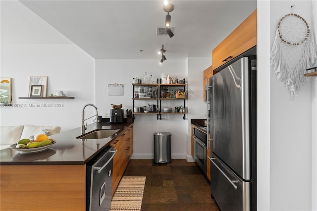 kitchen featuring open shelves, a sink, dark countertops, stainless steel appliances, and visible vents