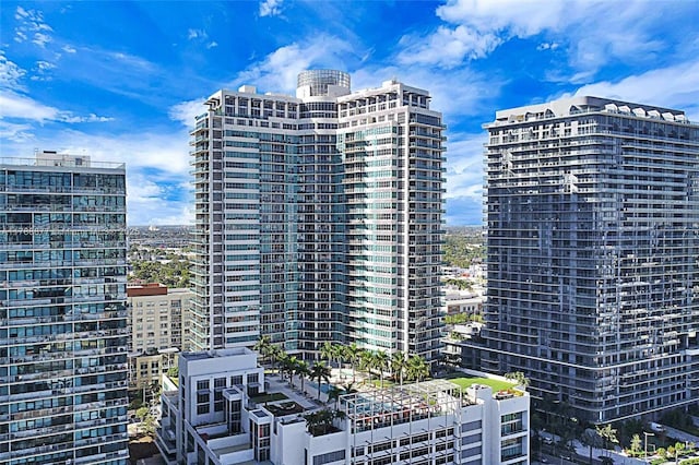 view of property with a city view