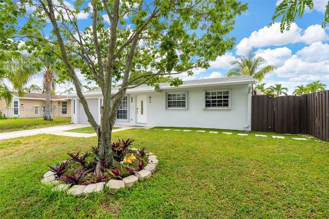 181 SW 76th Ter, Margate, FL 33068 - ranch-style house featuring stucco siding, a front lawn, concrete driveway, and an attached garage