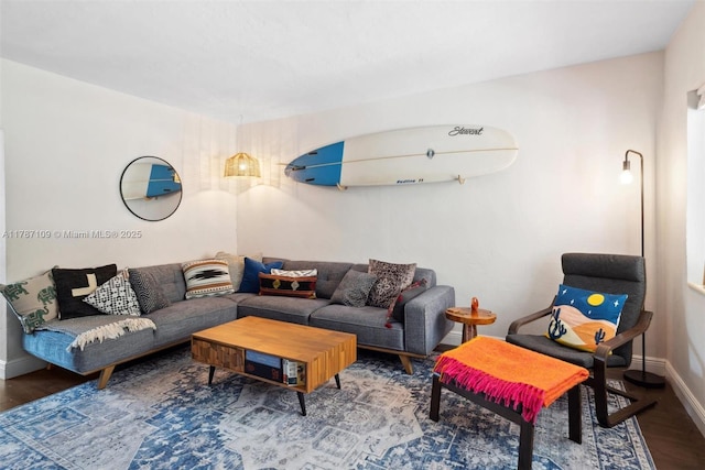 11105 NE 9th Ave, Biscayne Park, FL 33161 - living room featuring baseboards and wood finished floors