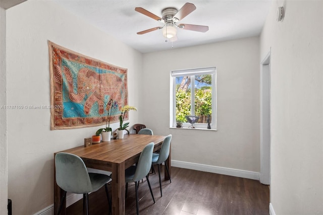 11105 NE 9th Ave, Biscayne Park, FL 33161 - dining area with baseboards, ceiling fan, and wood finished floors