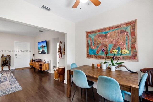 11105 NE 9th Ave, Biscayne Park, FL 33161 - dining area with baseboards, ceiling fan, visible vents, and wood finished floors