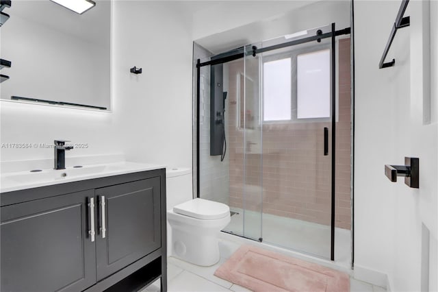 bathroom featuring a stall shower, toilet, tile patterned flooring, and vanity