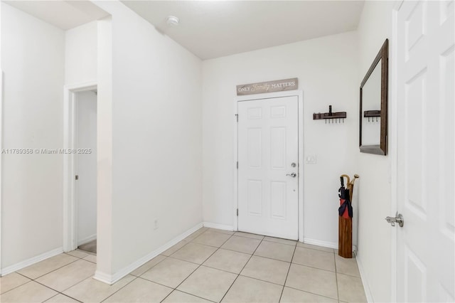 10860 79th St, E, FL 34219 - entrance foyer with baseboards and light tile patterned floors