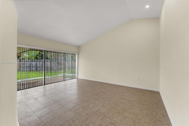 empty room with recessed lighting, vaulted ceiling, tile patterned floors, and baseboards