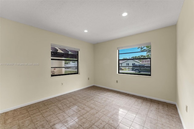 9130 SW 101st Ave, Miami, FL 33176 - unfurnished room featuring baseboards, recessed lighting, and a textured ceiling