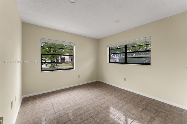 9130 SW 101st Ave, Miami, FL 33176 - empty room with baseboards and a textured ceiling