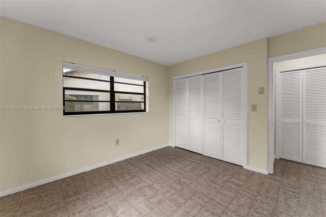 9130 SW 101st Ave, Miami, FL 33176 - unfurnished bedroom with a closet and baseboards