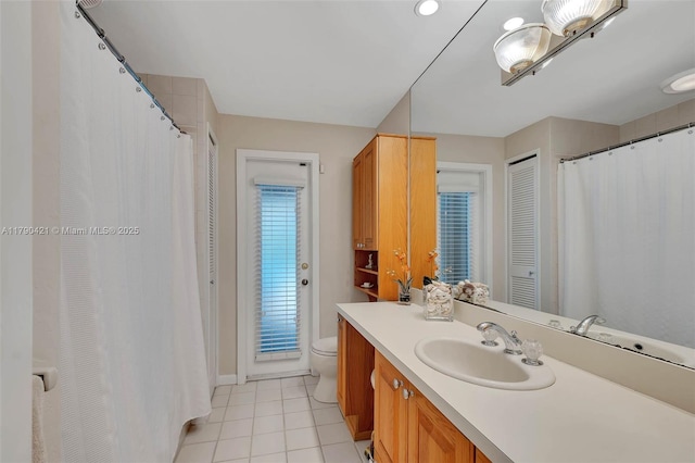 16745 SW 74th Ct, Palmetto Bay, FL 33157 - full bathroom featuring vanity, toilet, and tile patterned flooring