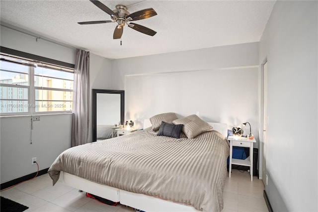 901 S Surf Rd Unit 603, Hollywood, FL 33019 - bedroom with baseboards, a ceiling fan, and a textured ceiling