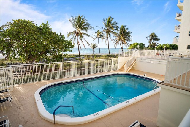 901 S Surf Rd Unit 603, Hollywood, FL 33019 - pool featuring stairway, a water view, and fence