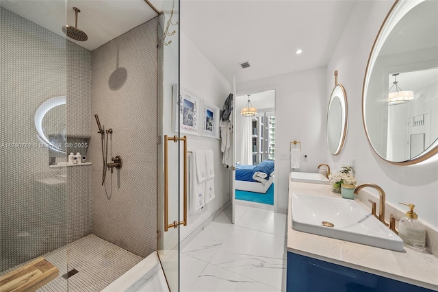 2655 S Bayshore Dr Unit 1006, Coconut Grove, FL 33133 - bathroom featuring visible vents, tiled shower, recessed lighting, and a sink
