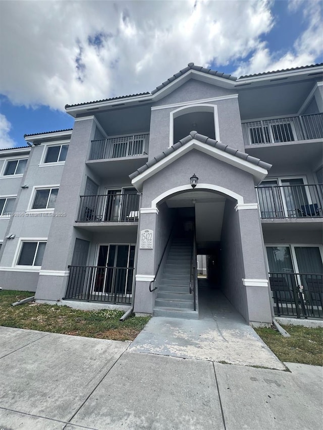 15422 SW 284th St Unit 7104, Homestead, FL 33033 - view of property featuring concrete driveway