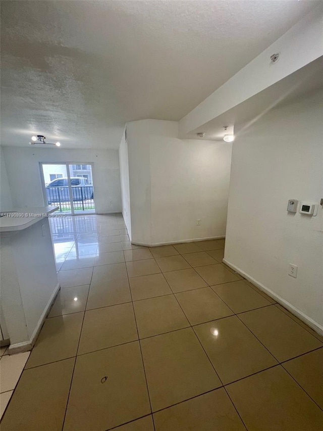 15422 SW 284th St Unit 7104, Homestead, FL 33033 - unfurnished room featuring a textured ceiling and light tile patterned floors