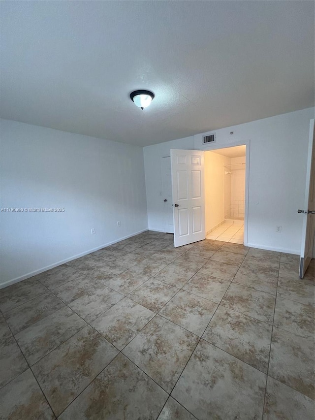 15422 SW 284th St Unit 7104, Homestead, FL 33033 - spare room featuring baseboards and tile patterned floors