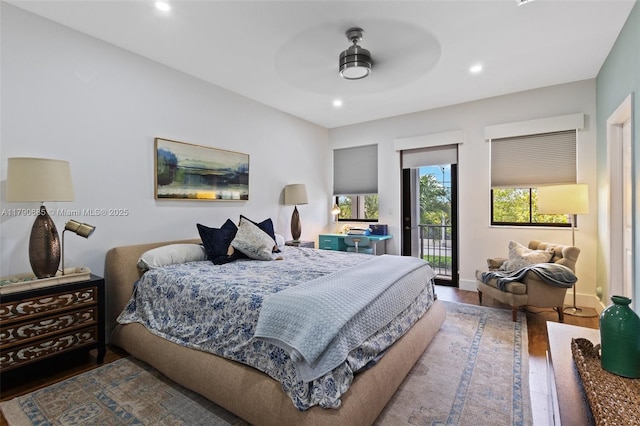 bedroom featuring a ceiling fan, wood finished floors, recessed lighting, and access to exterior