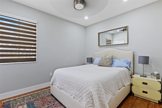 bedroom with a ceiling fan, recessed lighting, dark wood finished floors, and baseboards