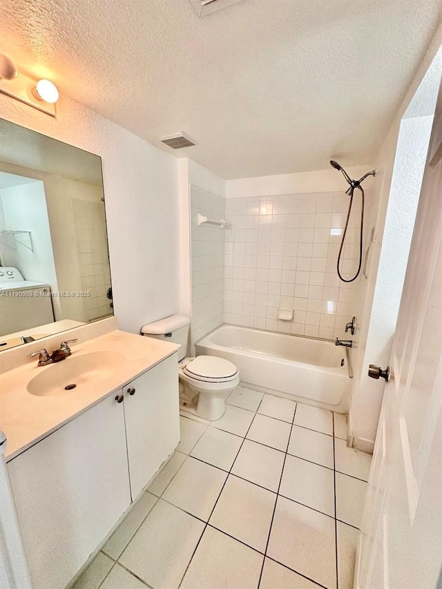 full bathroom with tile patterned floors, visible vents, washtub / shower combination, and a textured ceiling