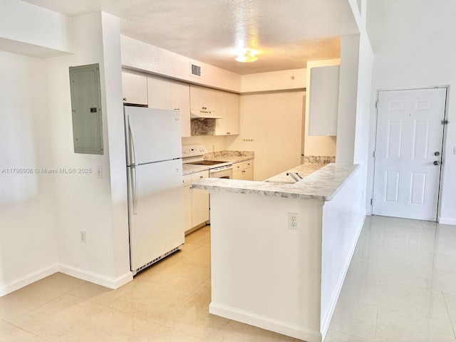 kitchen featuring white appliances, under cabinet range hood, light countertops, electric panel, and visible vents