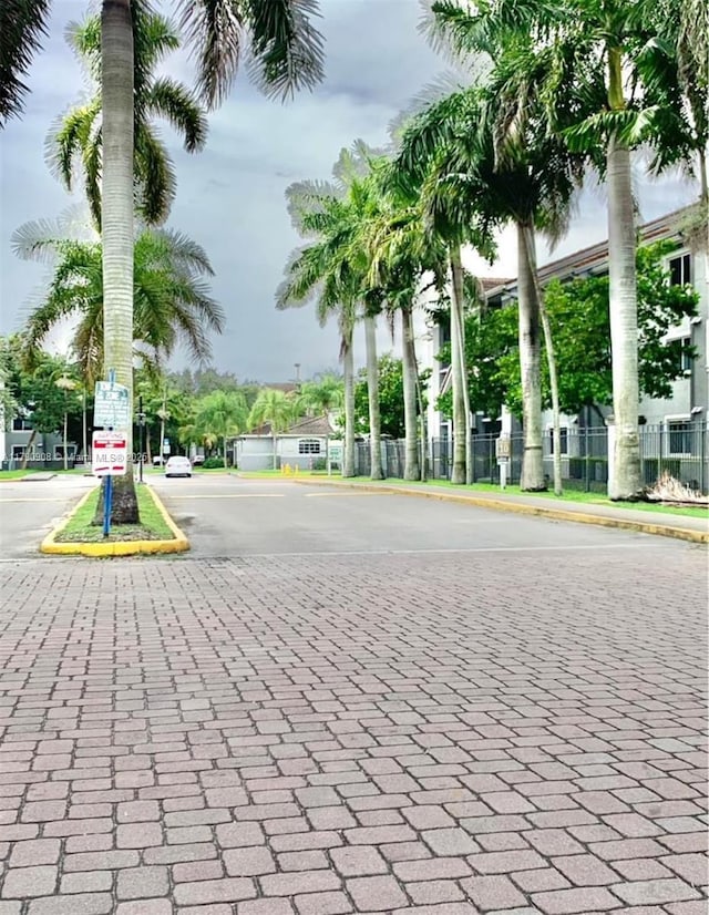 view of road with curbs and sidewalks