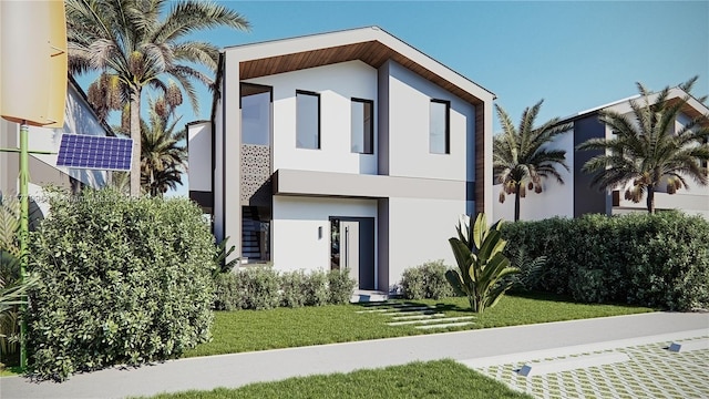 357 Smallwood Unit 1, Port St Lucie, FL 34982 - back of property with stucco siding and a yard