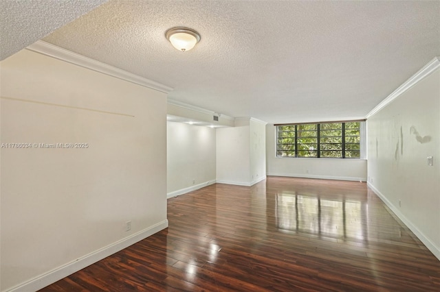 3100 NW 42nd Ave Unit D202, Coconut Creek, FL 33066 - empty room with crown molding, a textured ceiling, and hardwood / wood-style floors