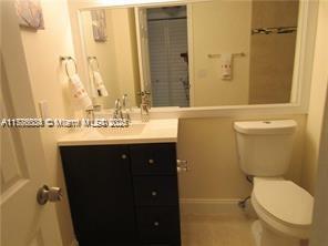 3100 NW 42nd Ave Unit D202, Coconut Creek, FL 33066 - bathroom with toilet and vanity