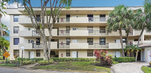 3100 NW 42nd Ave Unit D202, Coconut Creek, FL 33066 - view of apartment building / complex