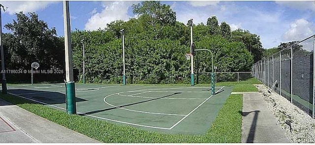 3100 NW 42nd Ave Unit D202, Coconut Creek, FL 33066 - view of basketball court with fence and community basketball court
