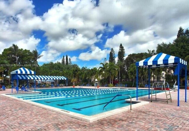 3100 NW 42nd Ave Unit D202, Coconut Creek, FL 33066 - view of community pool