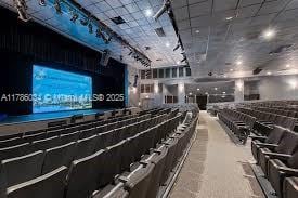 3100 NW 42nd Ave Unit D202, Coconut Creek, FL 33066 - home theater room with a drop ceiling