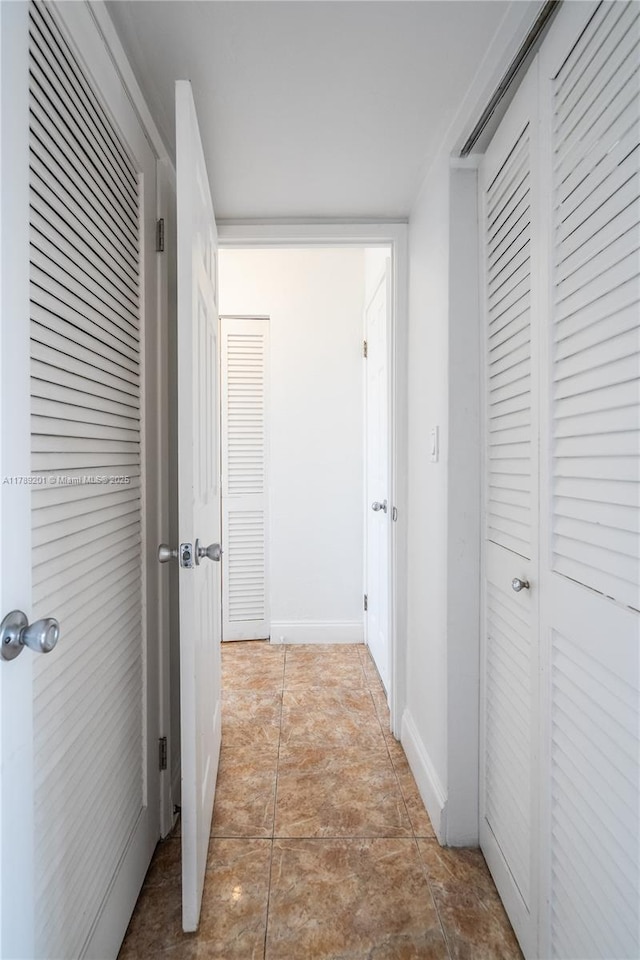 7850 Byron Ave Unit 207, Miami Beach, FL 33141 - hallway with baseboards